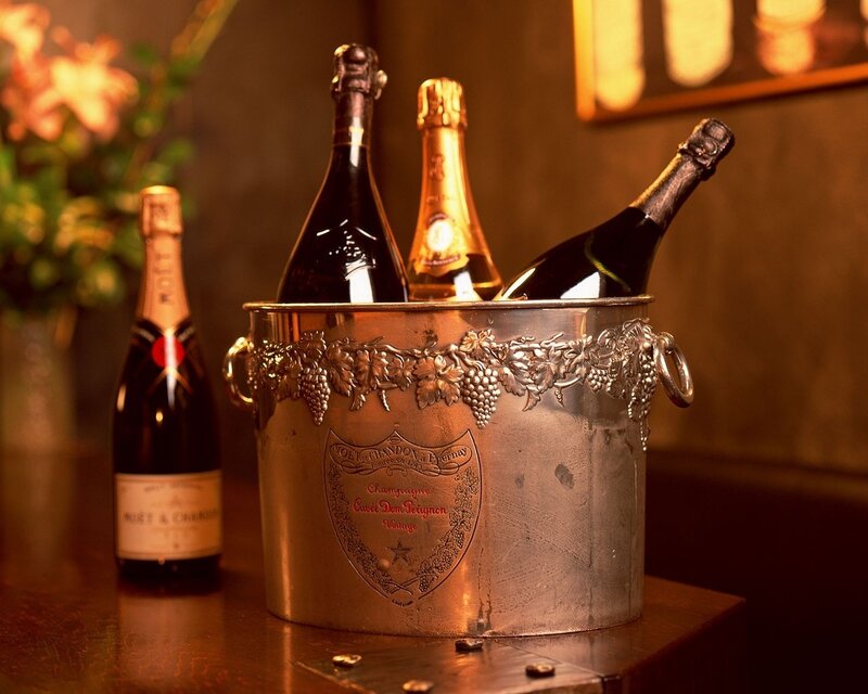 Champagne Bottles in Ice Bucket — Gold