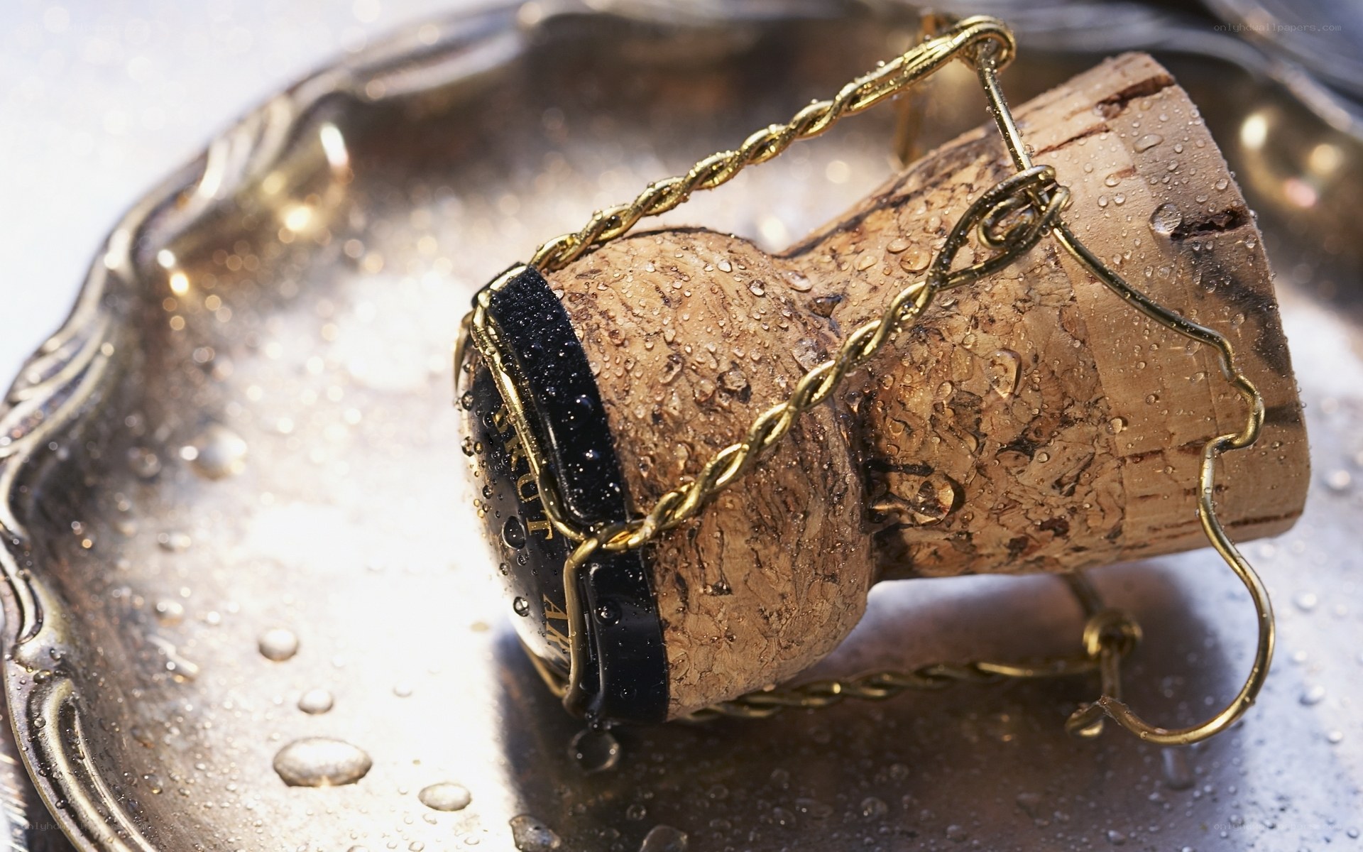 Champagne cork on silver tray
