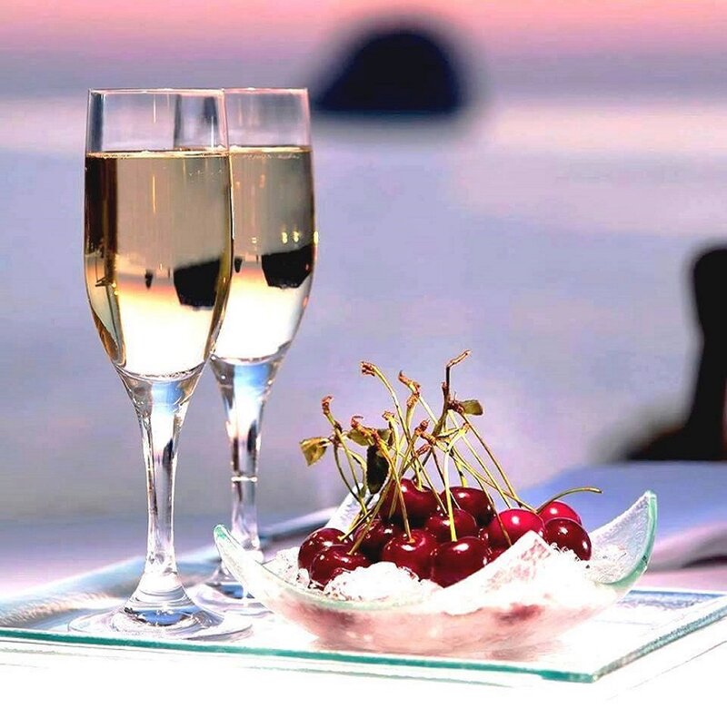 Champagne Glasses and Cherries