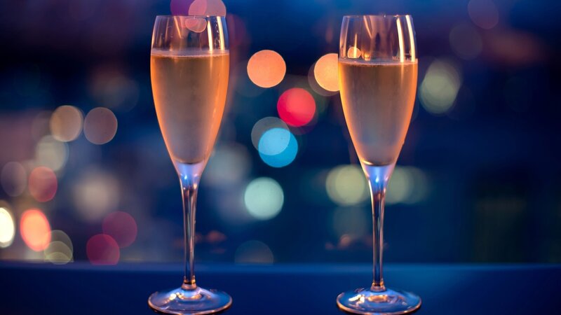 Champagne glasses at night