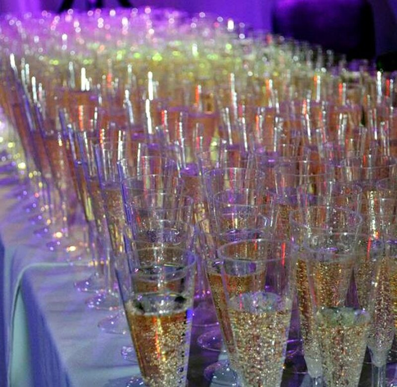 Champagne Glasses on Table — Purple