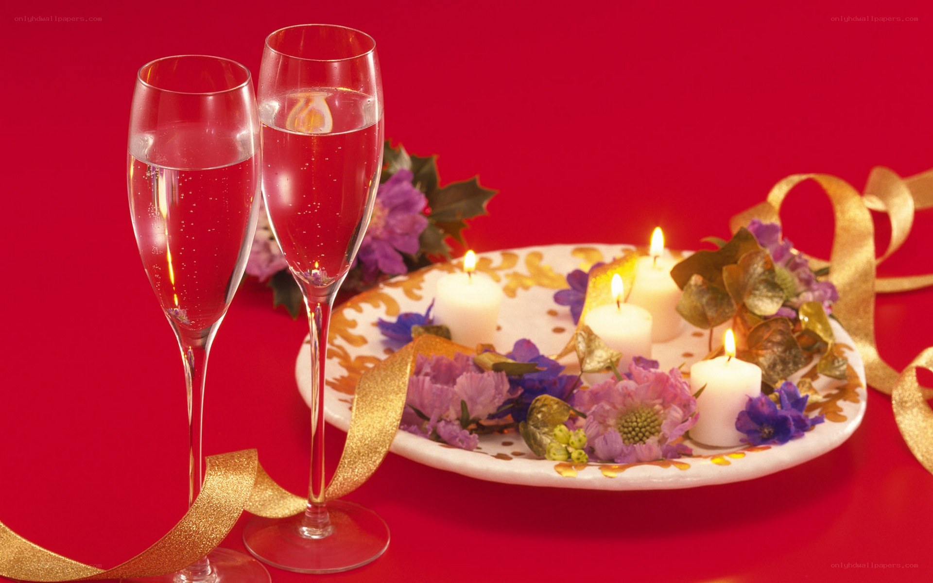 Champagne glasses with candles