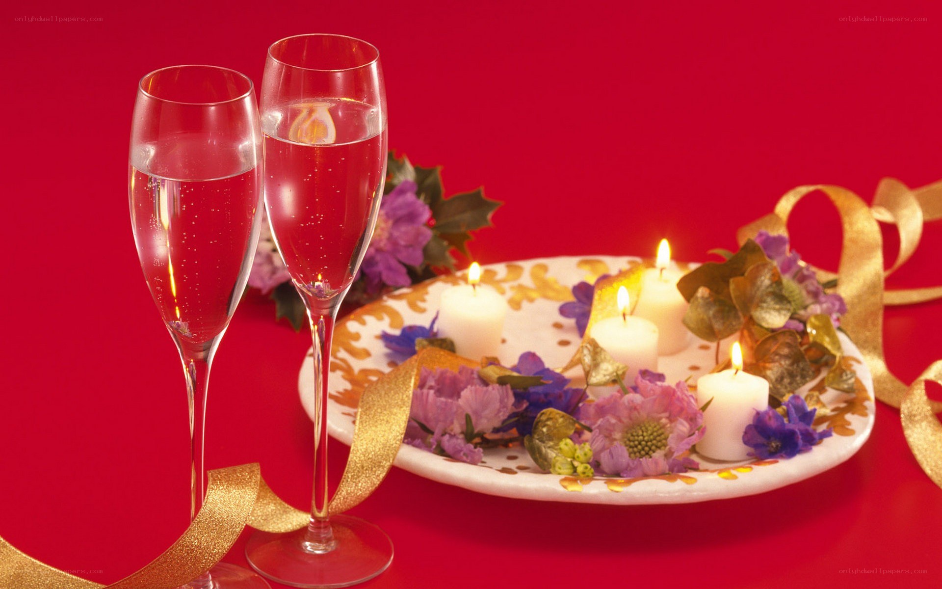 Champagne glasses with candles