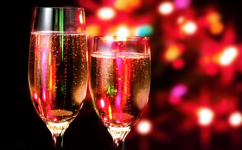 Champagne glasses with festive lights