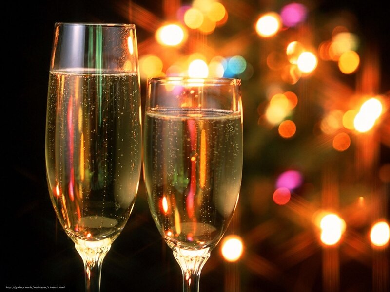 Champagne glasses with festive lights