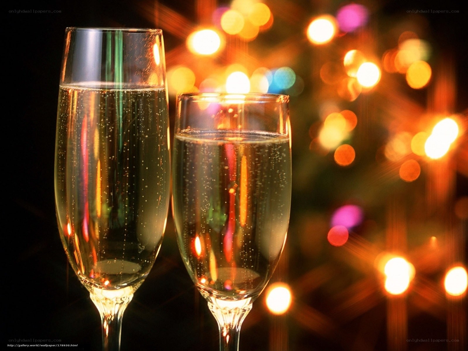 Champagne glasses with festive lights