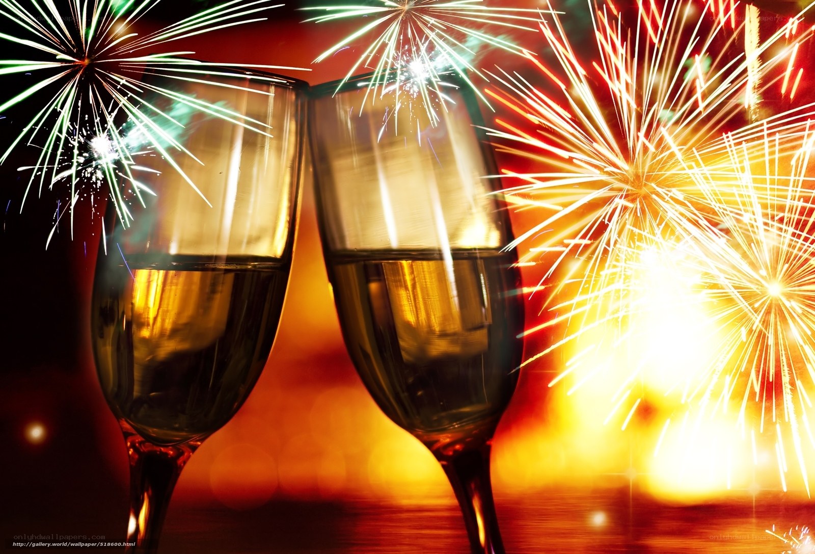 Champagne glasses with fireworks