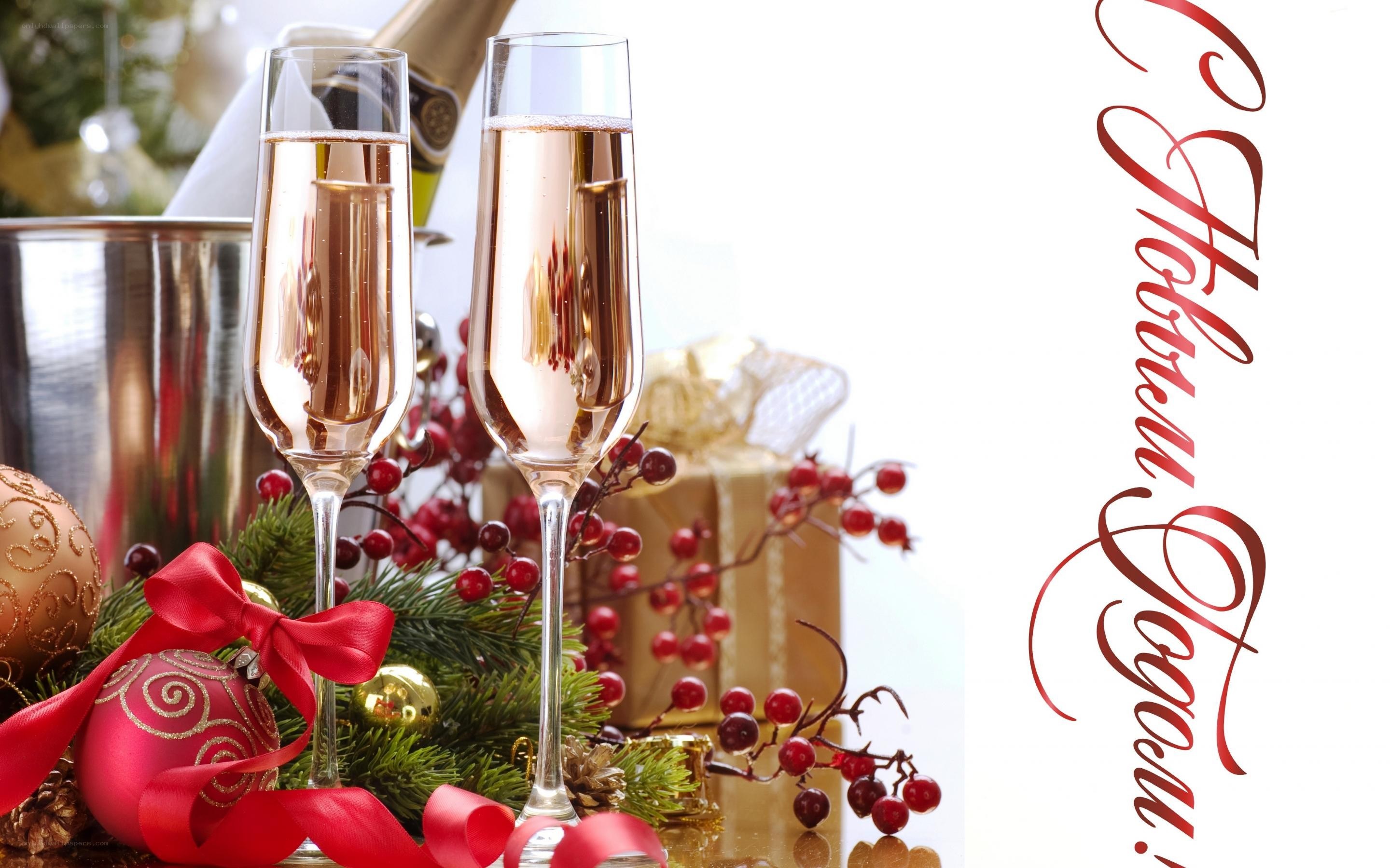 Champagne glasses with holiday decor