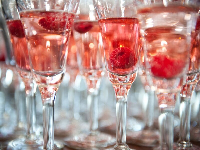 Champagne Glasses with Raspberries