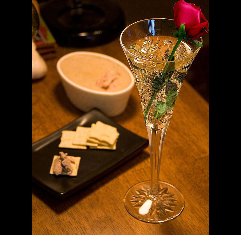 Champagne with rose and crackers