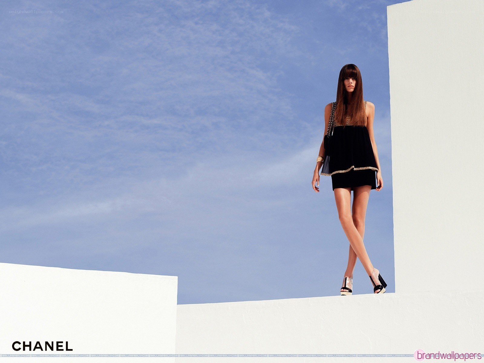 Chanel fashion model on white steps