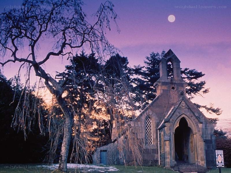 Chapel at dusk with full moon