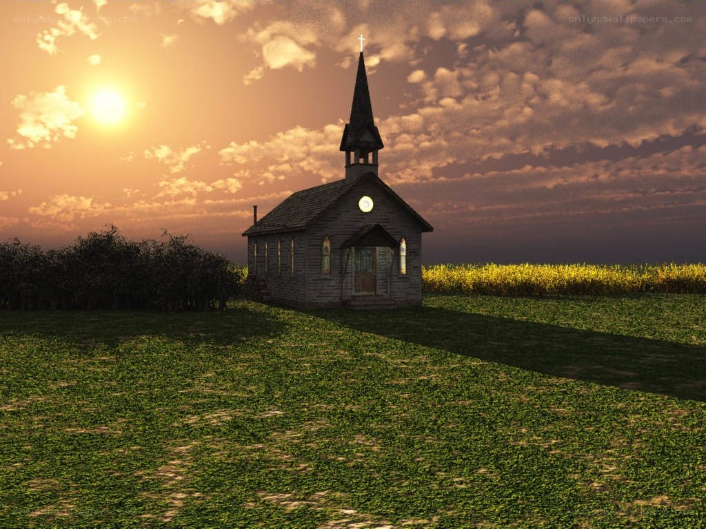 Chapel at sunset in a field