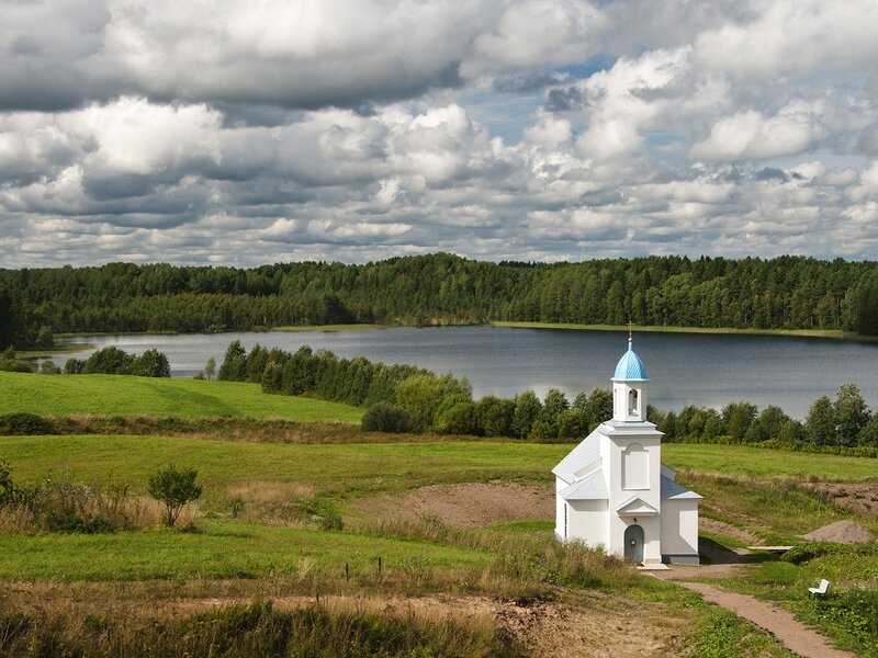 Chapel by a lake in the countryside