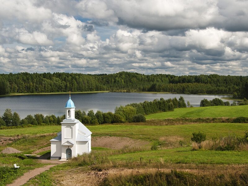 Chapel by a lake in the countryside
