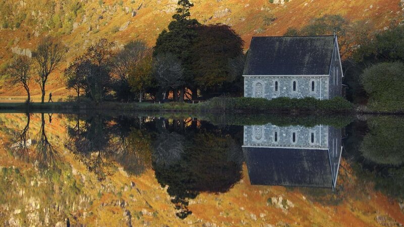 Chapel by the lake in autumn