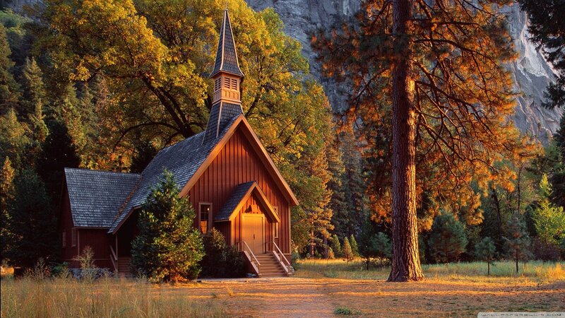 Chapel in a forest at sunset