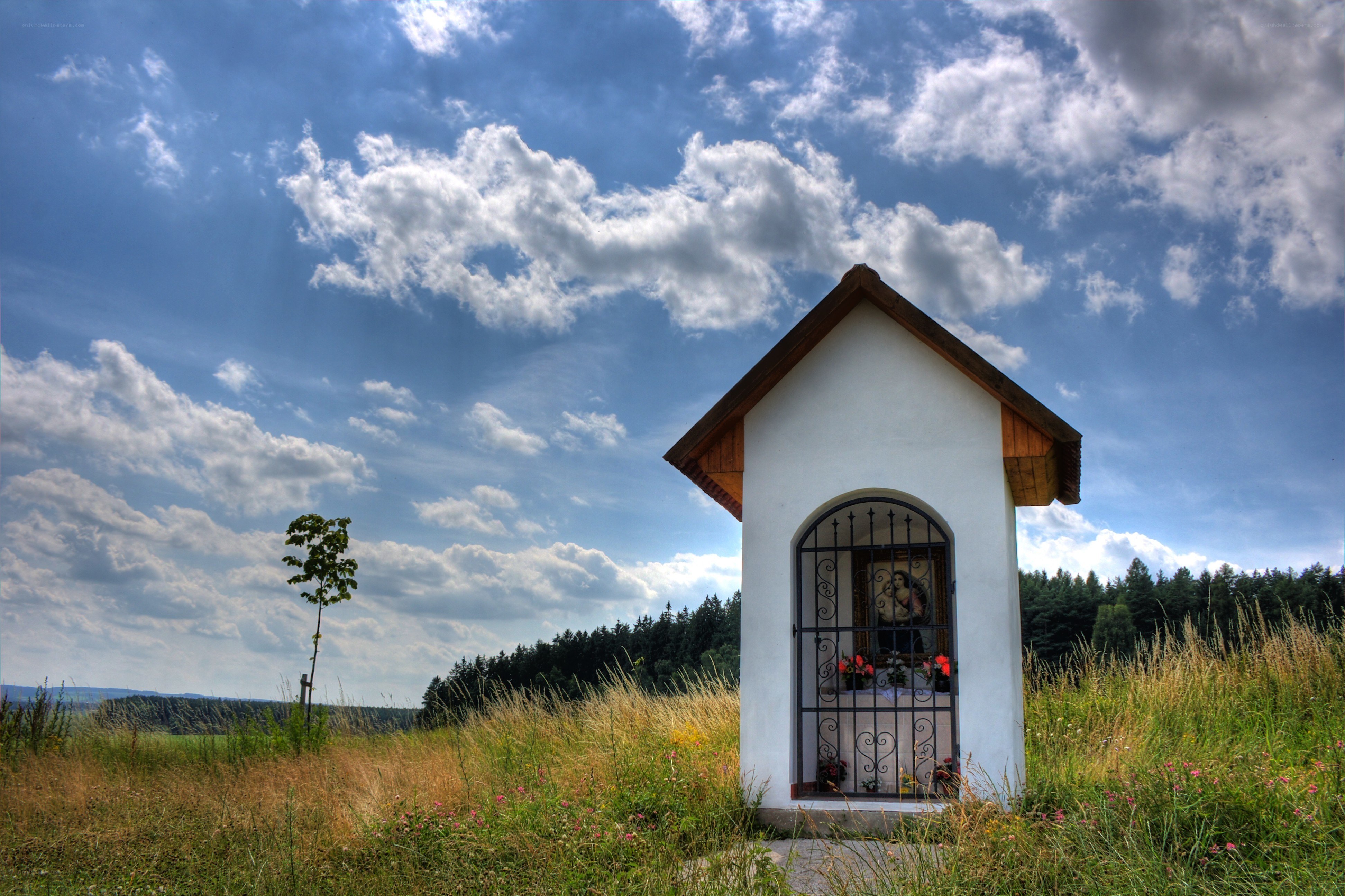 Chapel in a grassy field