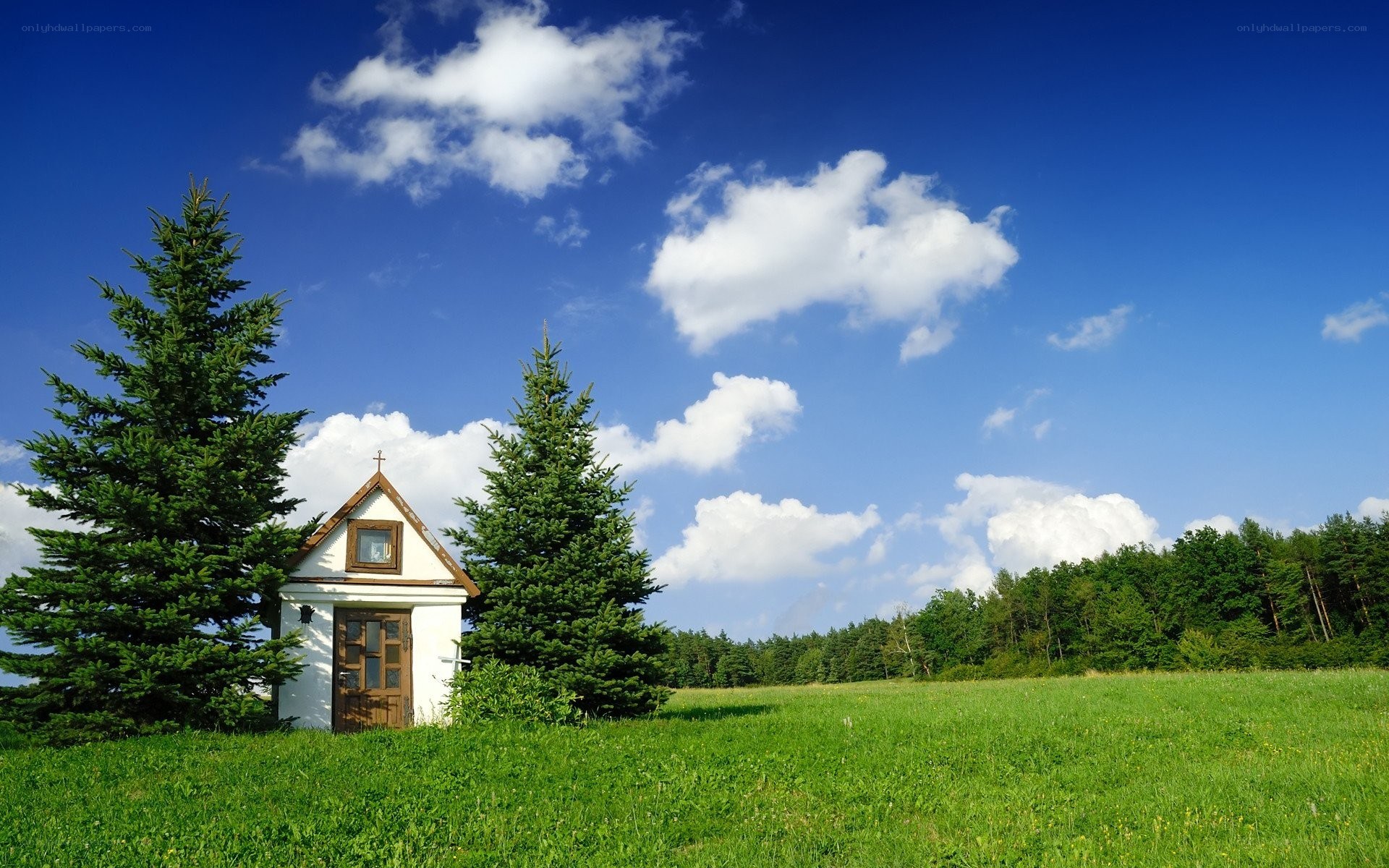 Chapel in a green field