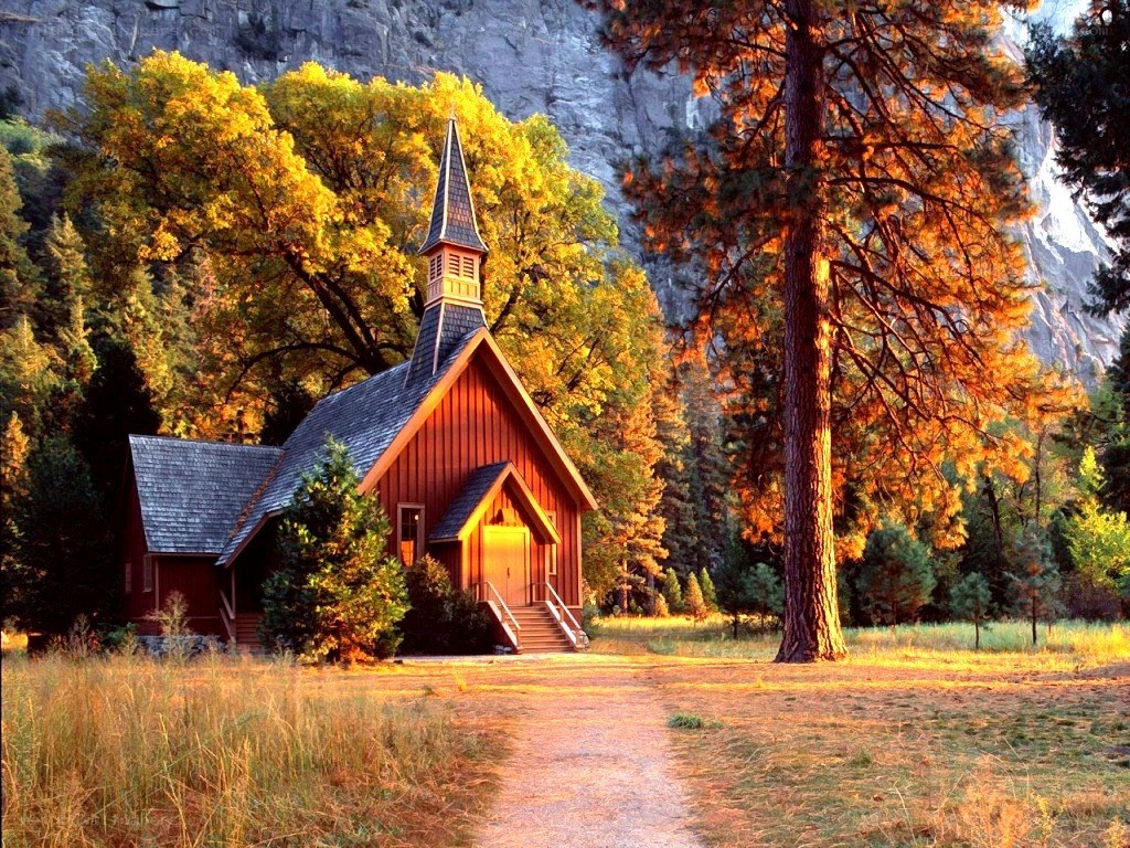 Chapel in autumn forest