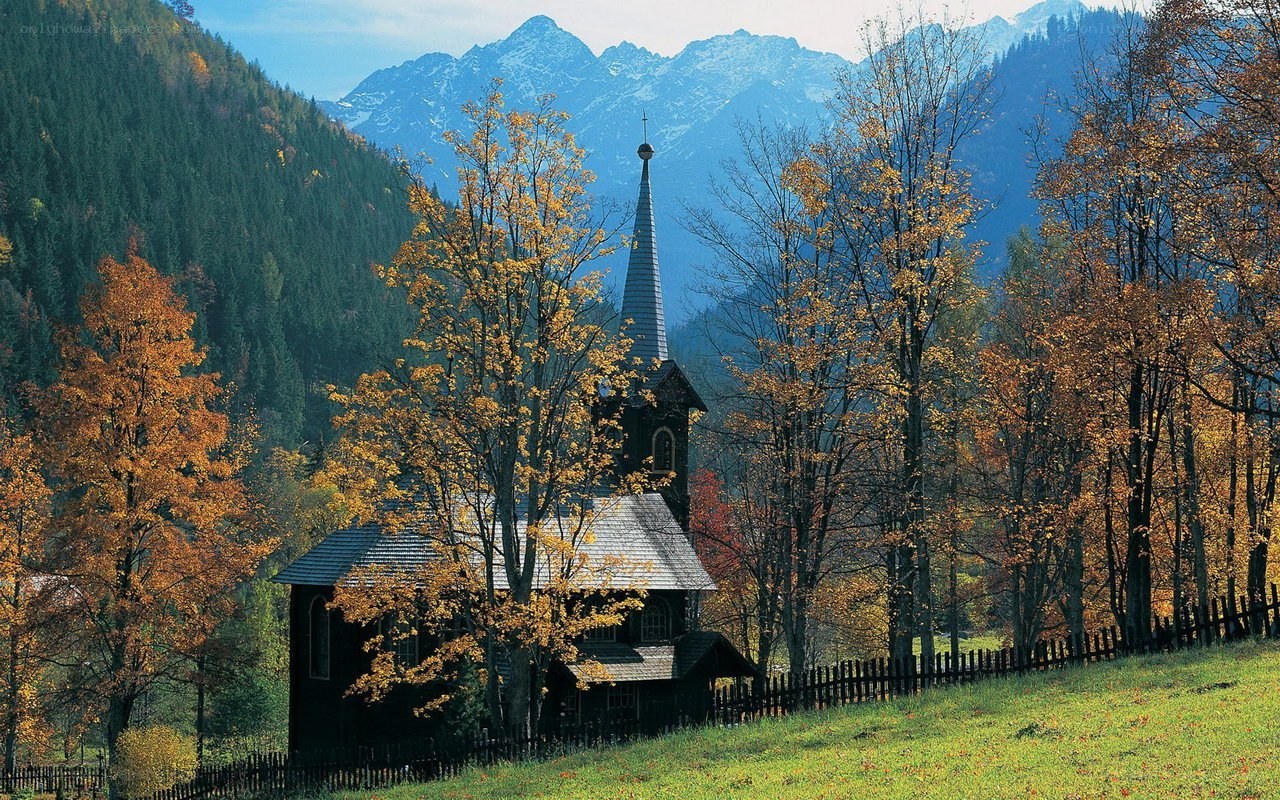 Chapel in autumn mountains