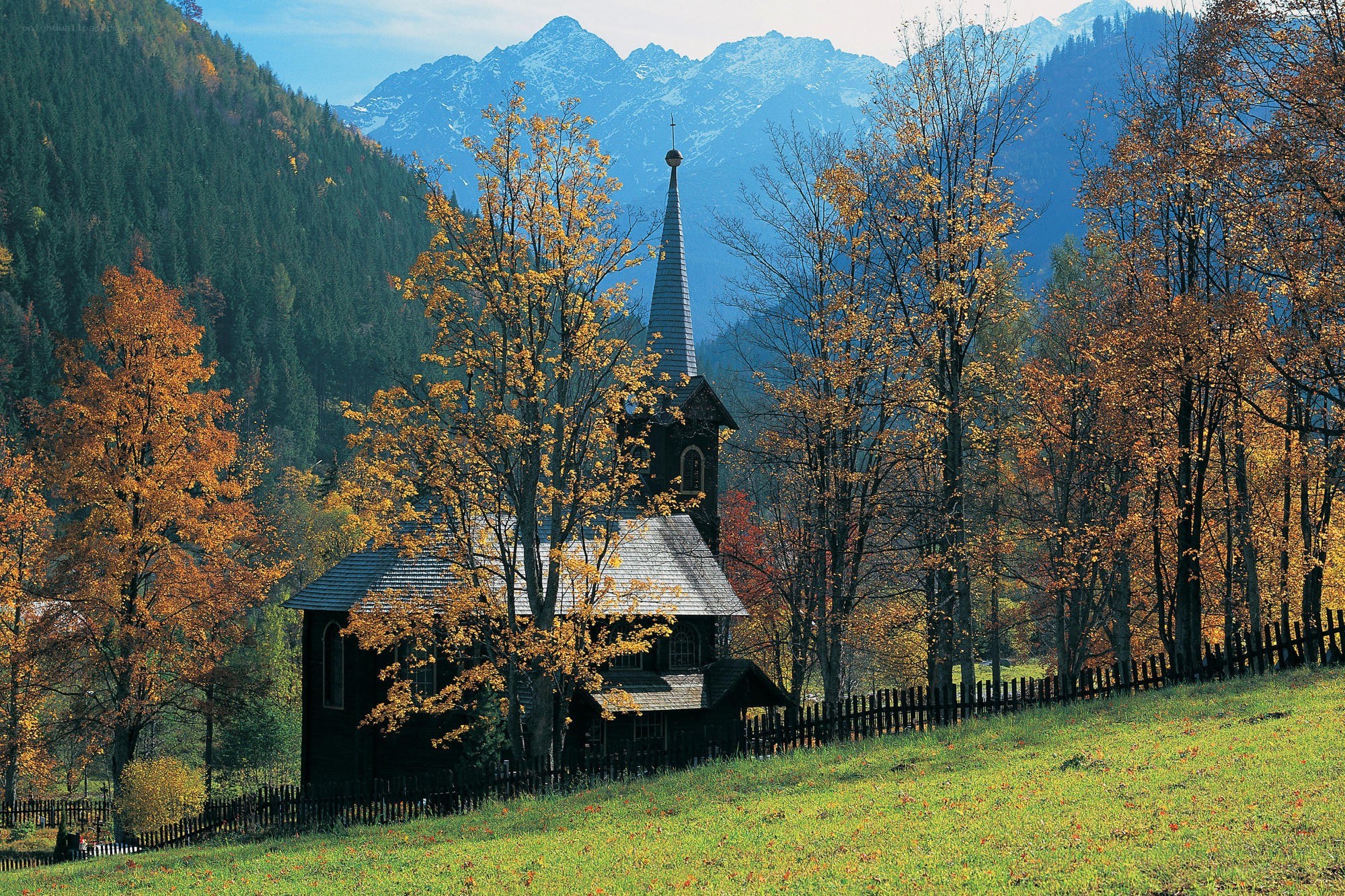 Chapel in autumn mountains