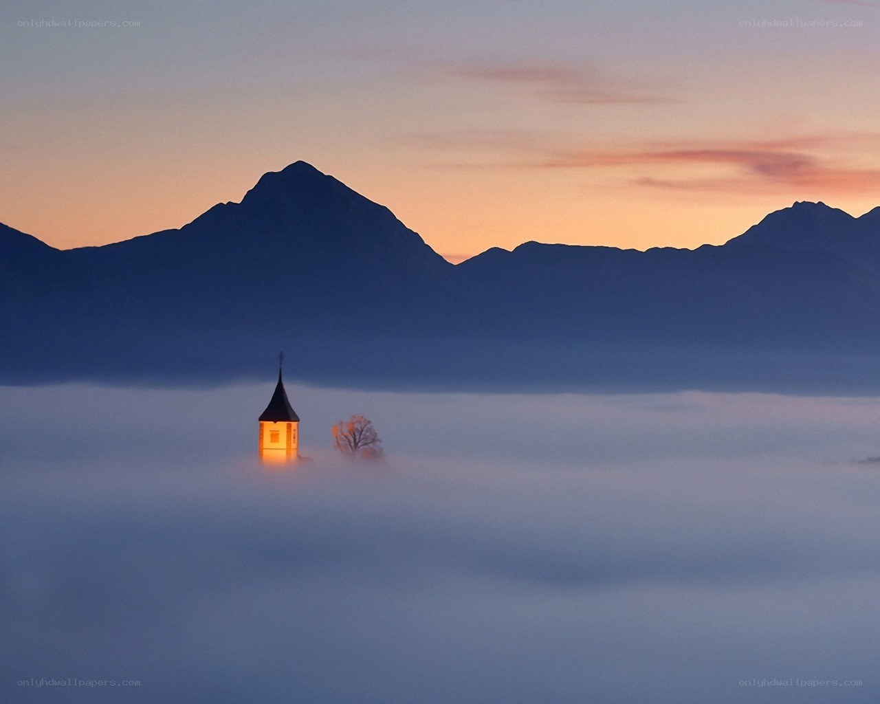 Chapel in the mist at dawn