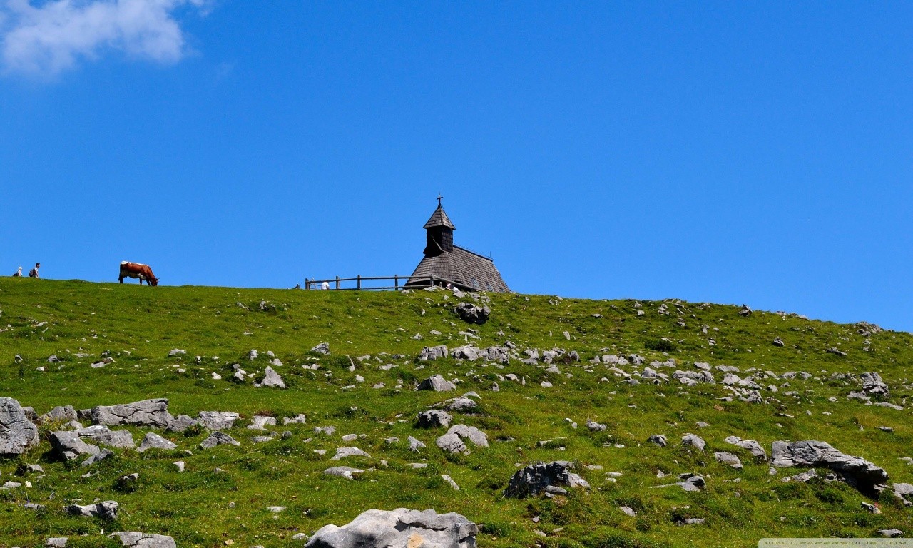 Chapel on a grassy hill