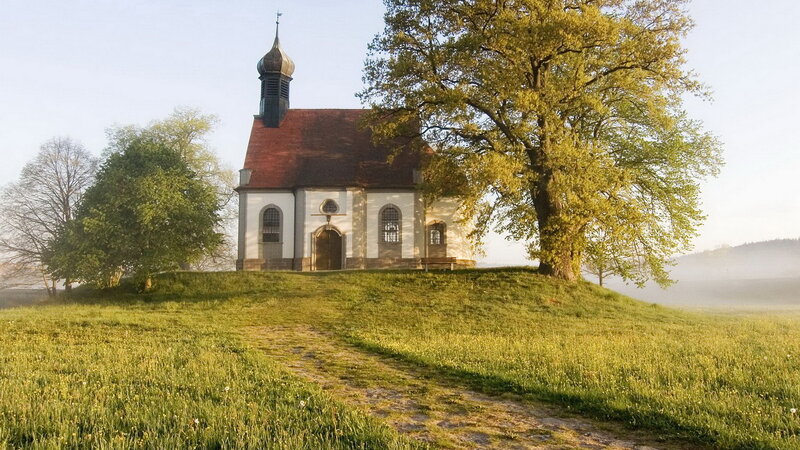 Chapel on a hill at sunrise