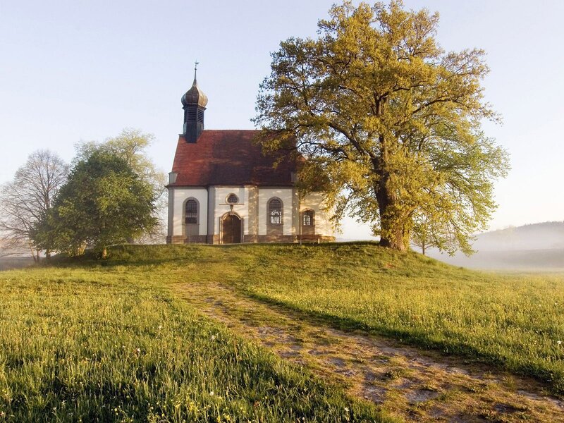 Chapel on a hill at sunrise