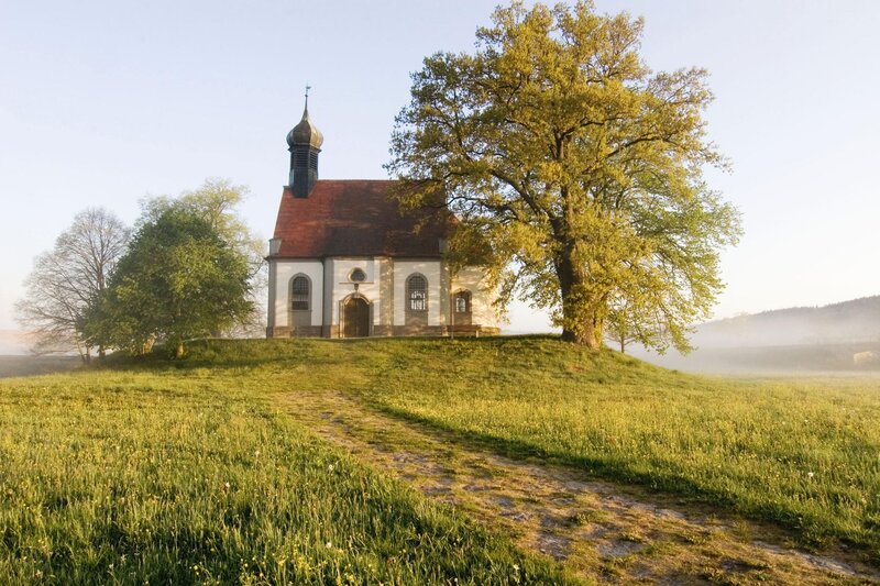 Chapel on a hill at sunrise