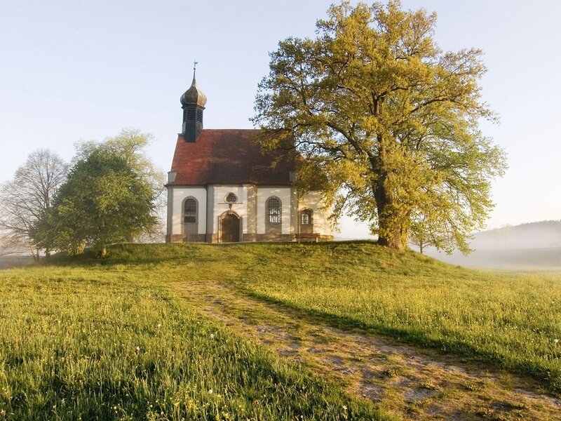 Chapel on a hill at sunrise