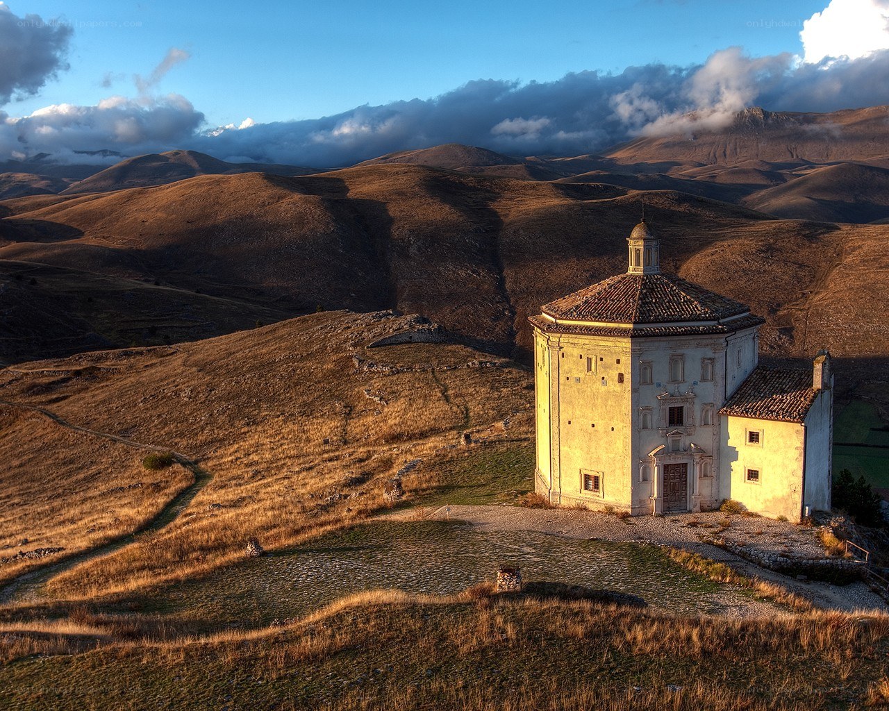Chapel on a hill at sunset
