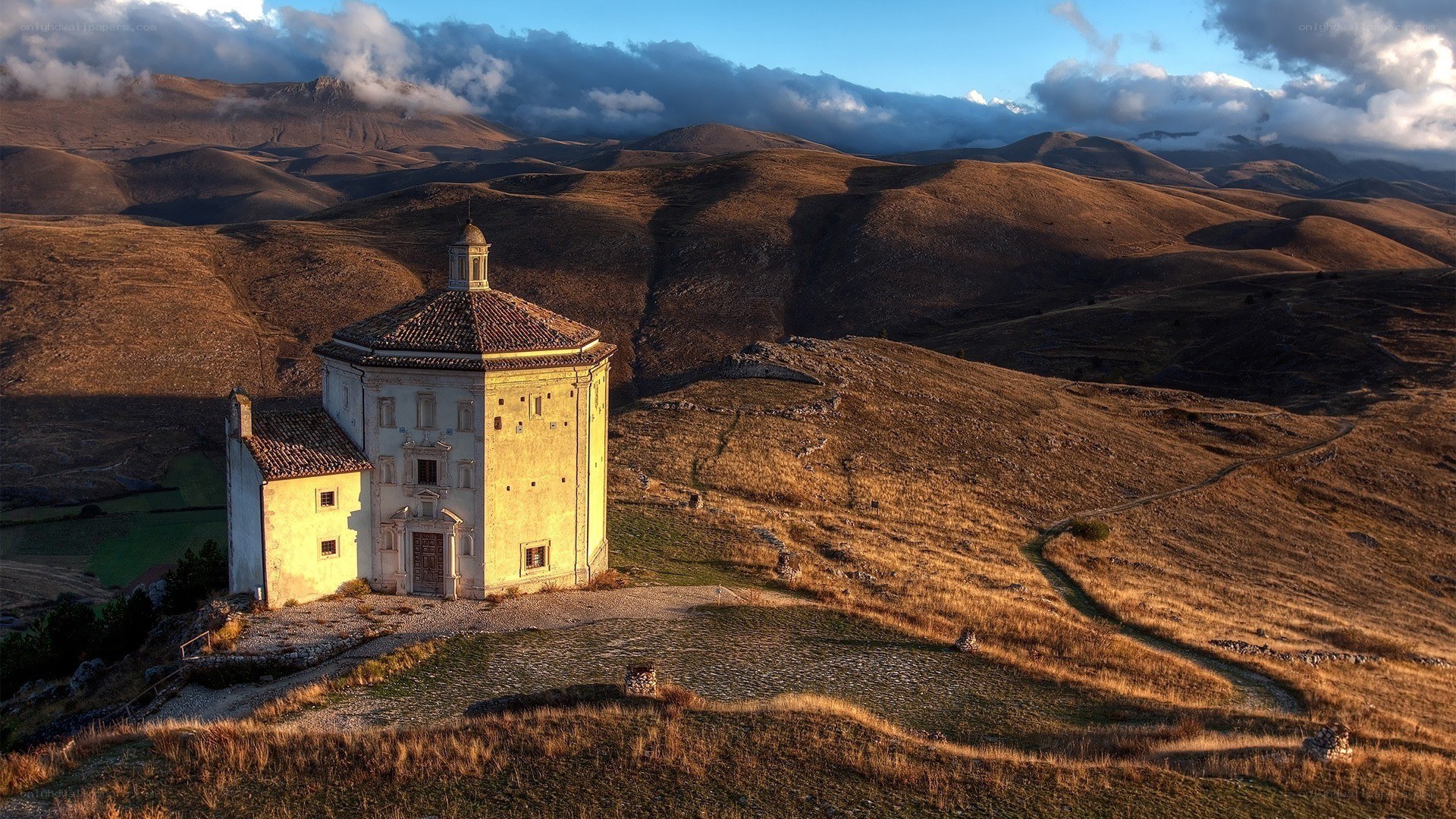 Chapel on a hill at sunset