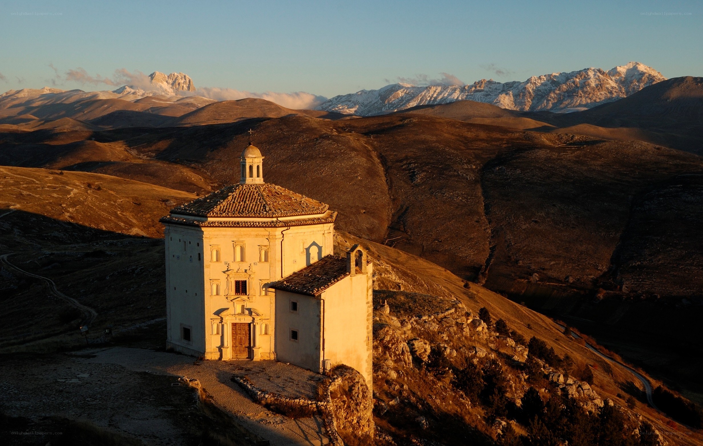 Chapel on a hill at sunset