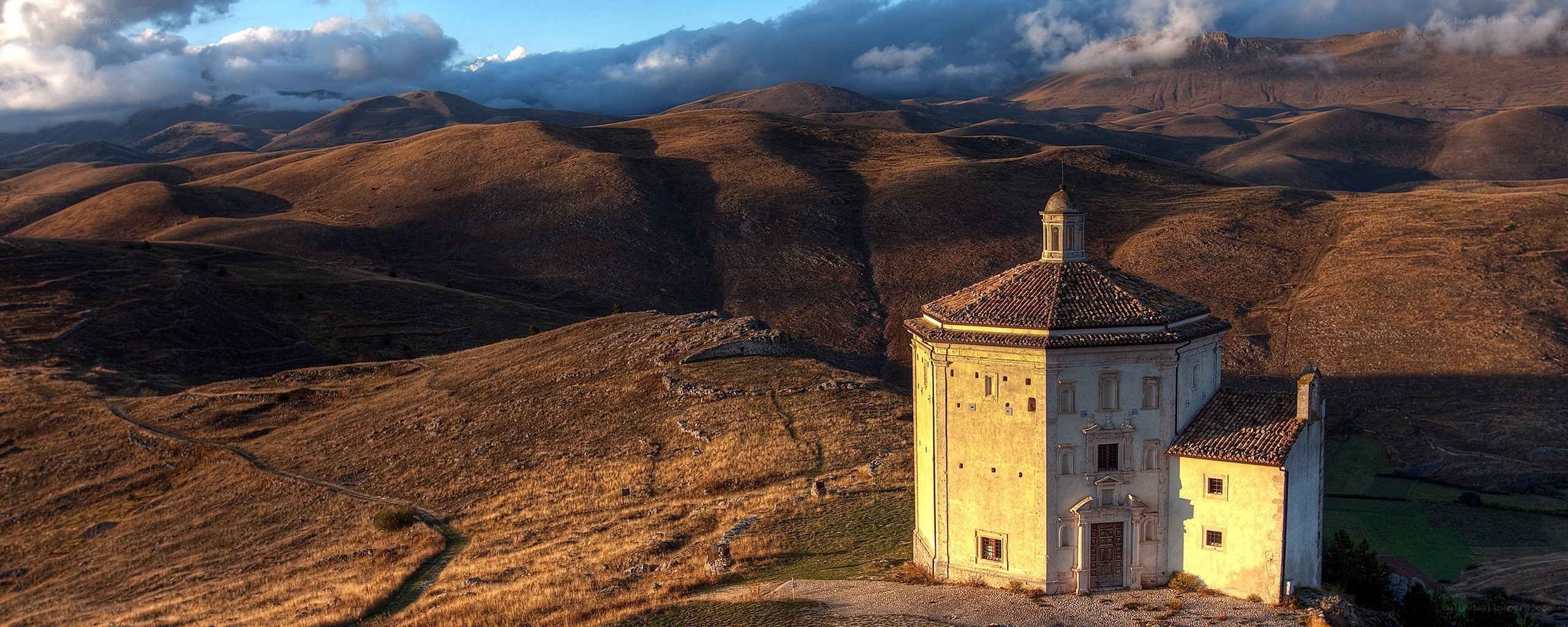 Chapel on a hill at sunset