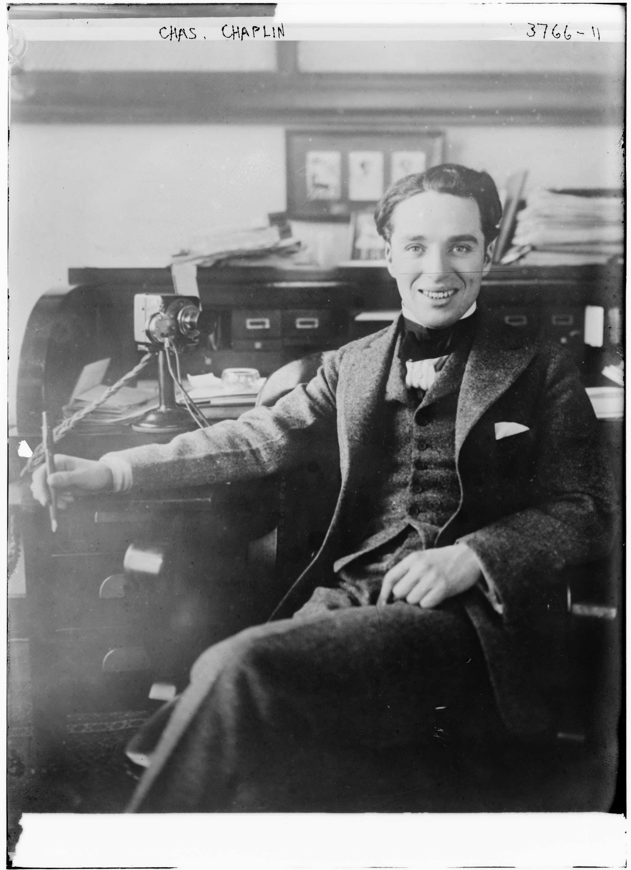 Chaplin at his desk