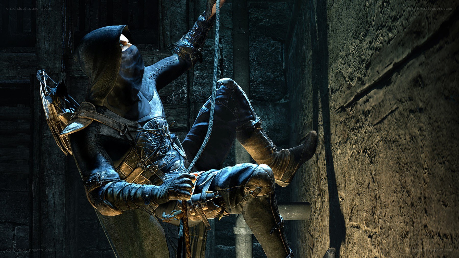 Character climbing rope in dark dungeon