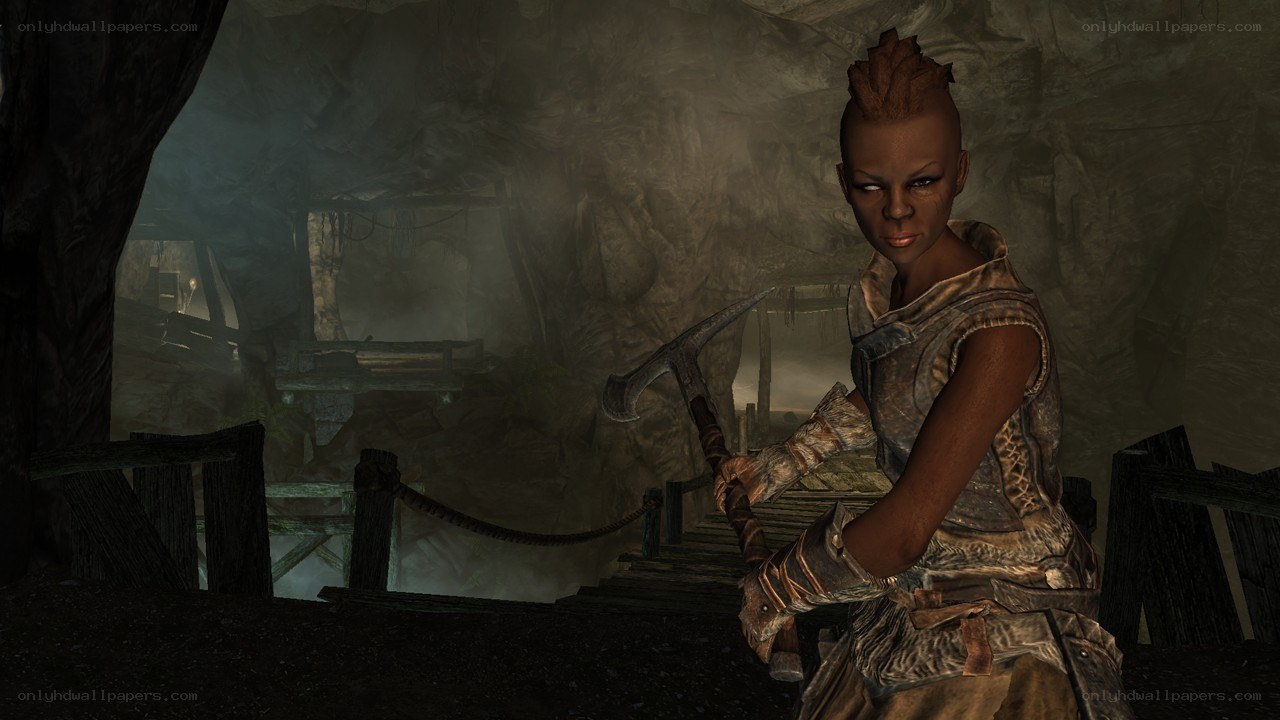 Character in a cave holding an axe