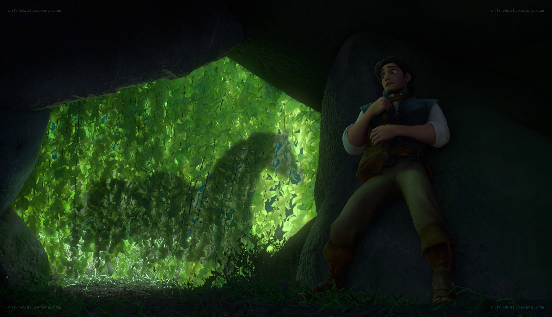 character in a cave with green light