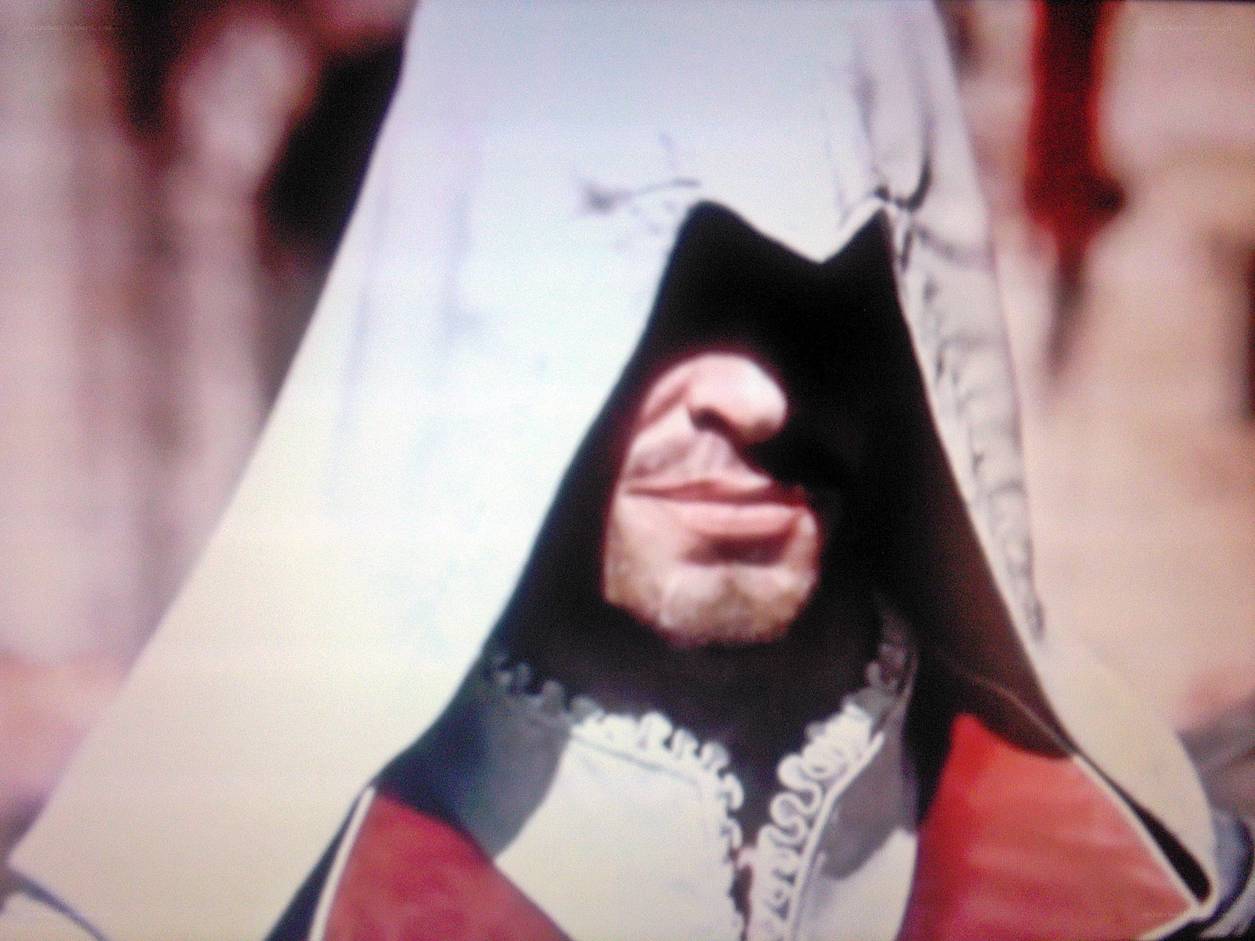 character in hooded cloak