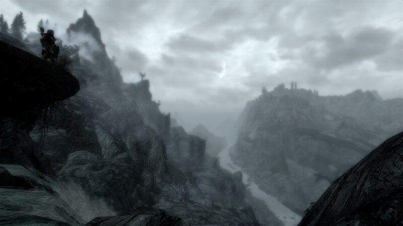 Character on Rocky Cliff — Gray, Dreary, Misty