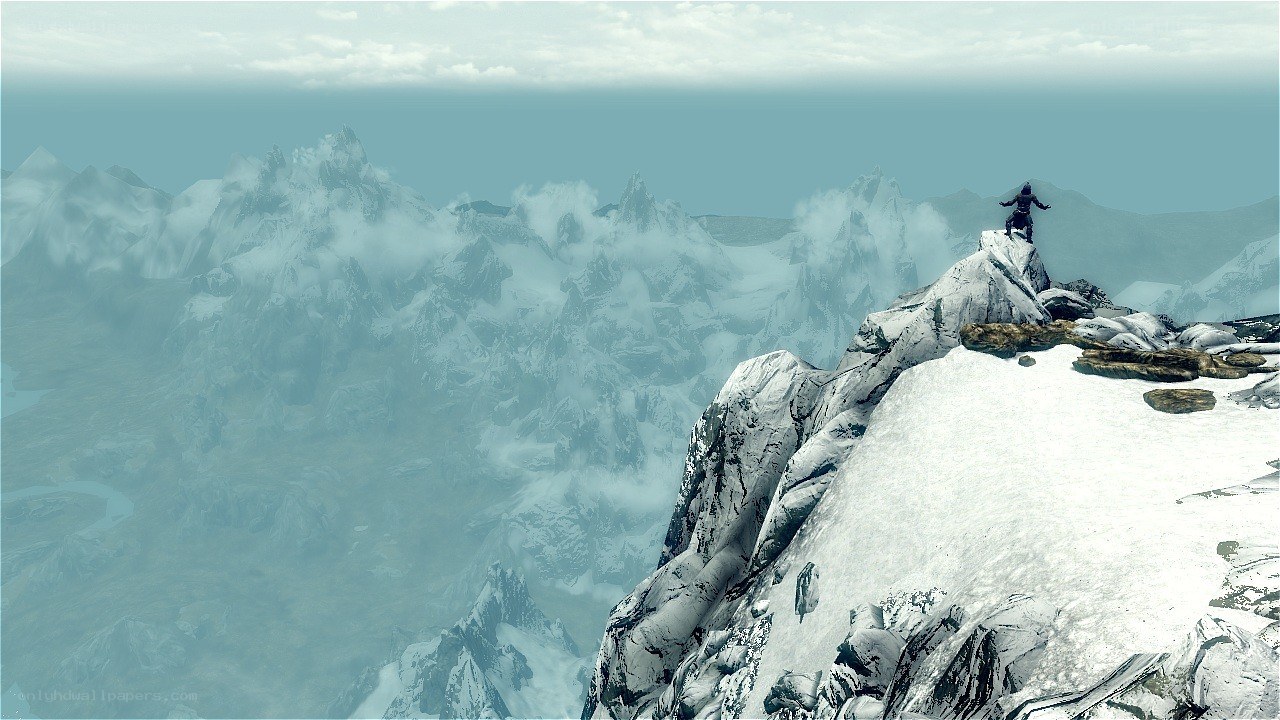character on snowy mountain peak