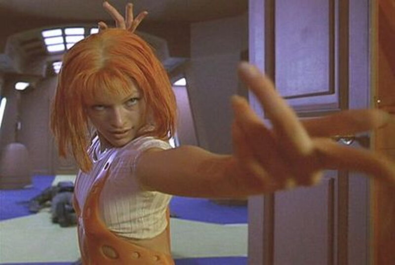 character with orange hair extending hand