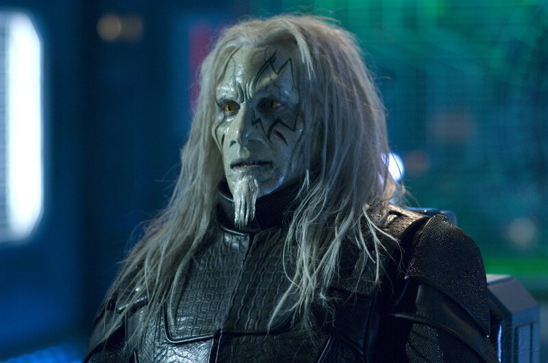 character with white hair and face paint