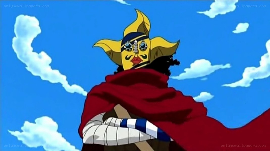 character with yellow mask and red cape