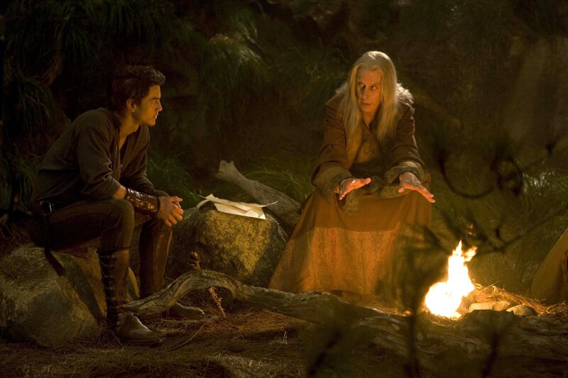 Characters by a campfire