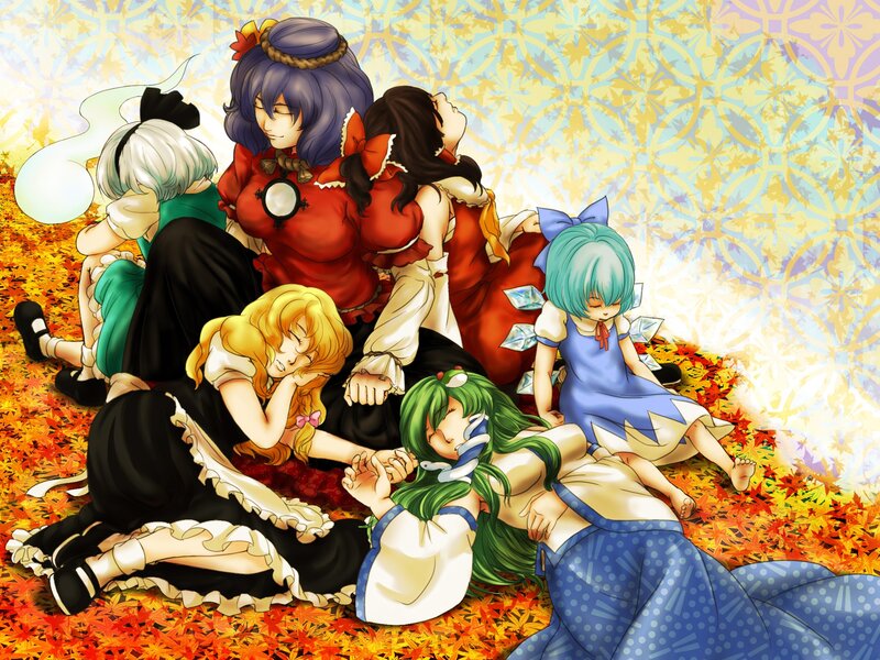 Characters resting in autumn leaves