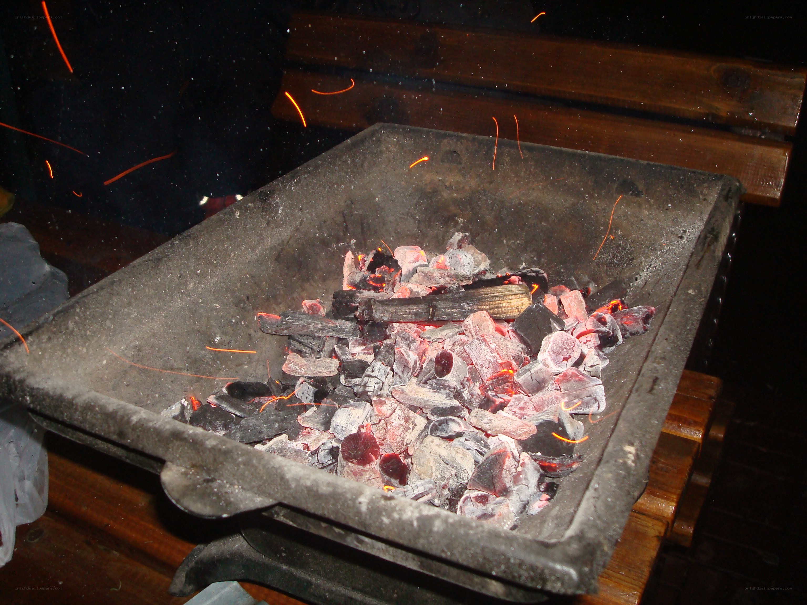 Charcoal burning in a grill