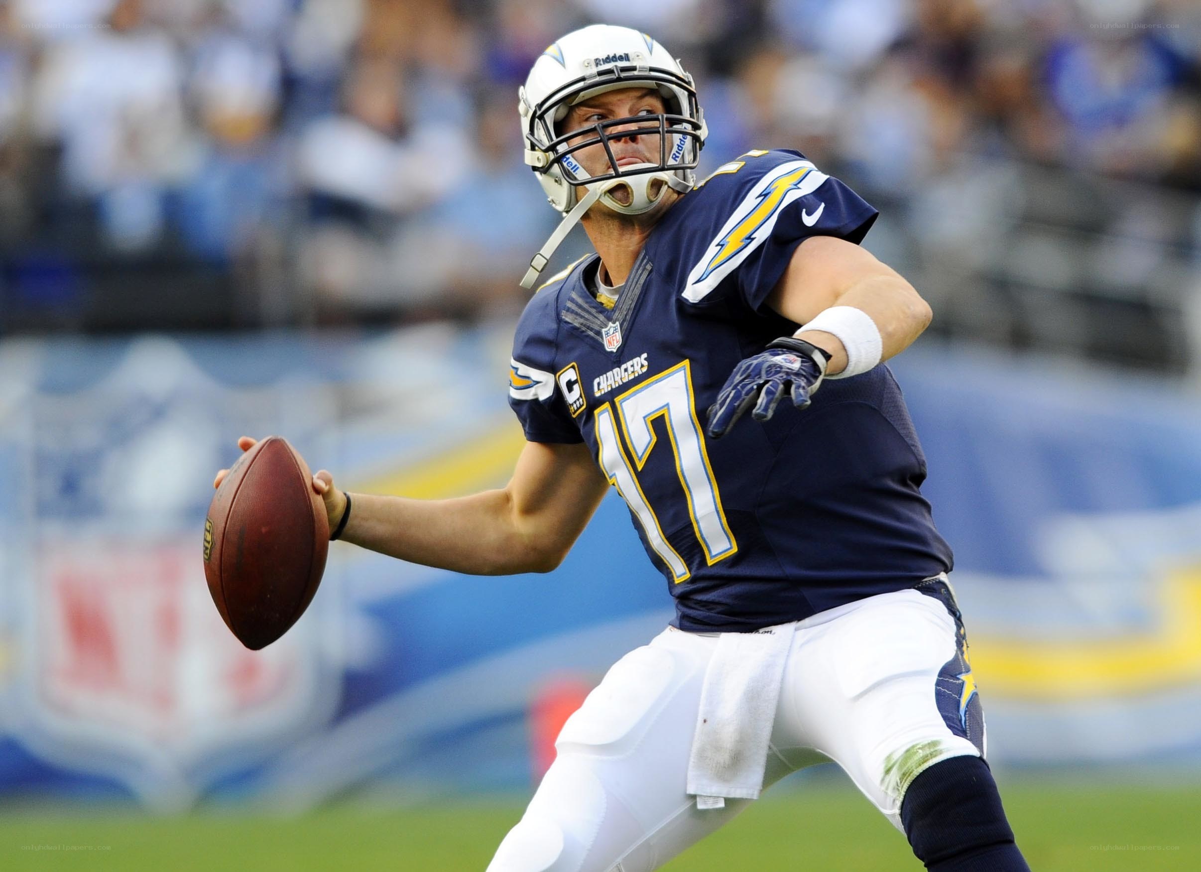 Chargers quarterback throwing ball